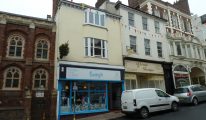 Exeter shop let for Landlord
